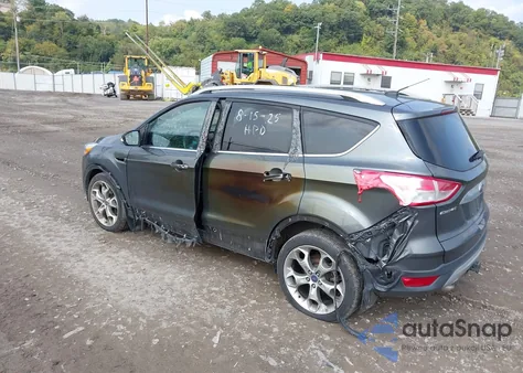 2015 Ford Escape Titanium z USA, uszkodzony, nr VIN 1FMCU9J96FUB11569